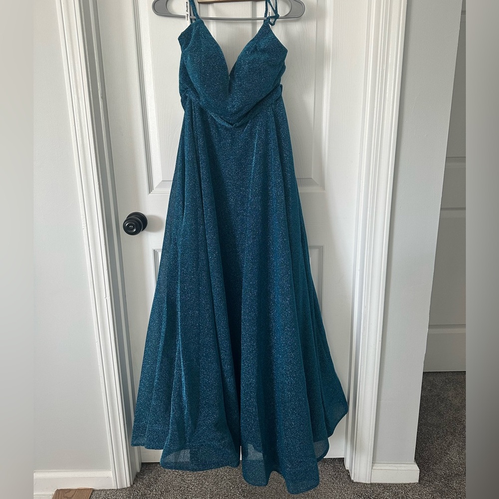 Size 10 sparkly blue gown with zipper and corset back and high slit